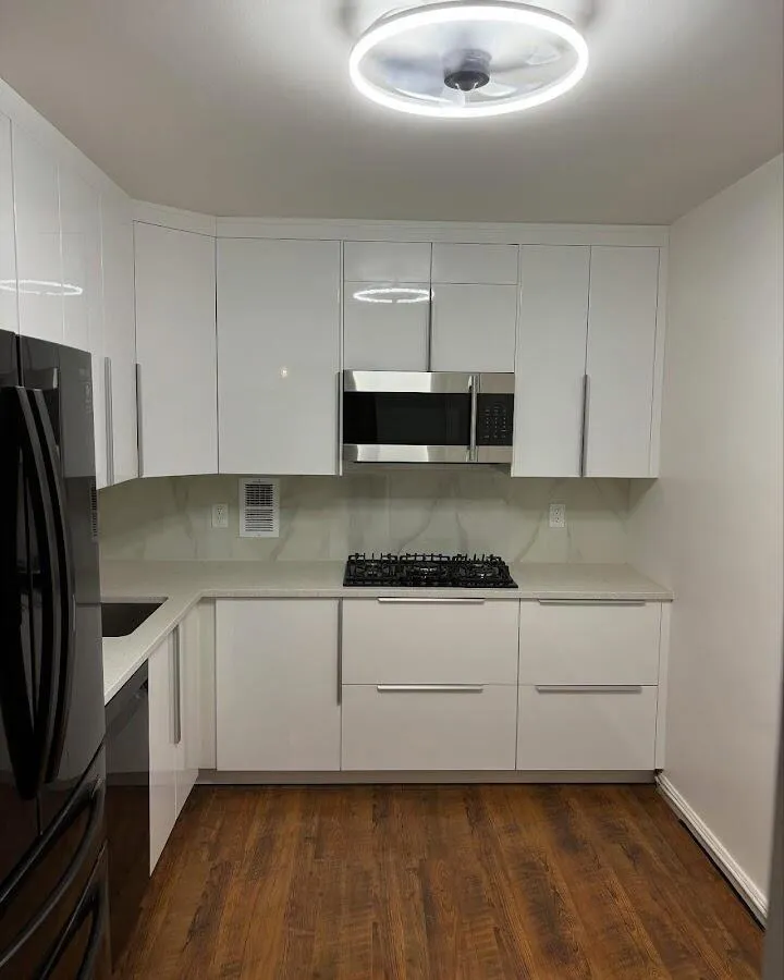 Renovated kitchen with quartz countertops in Lowes Island